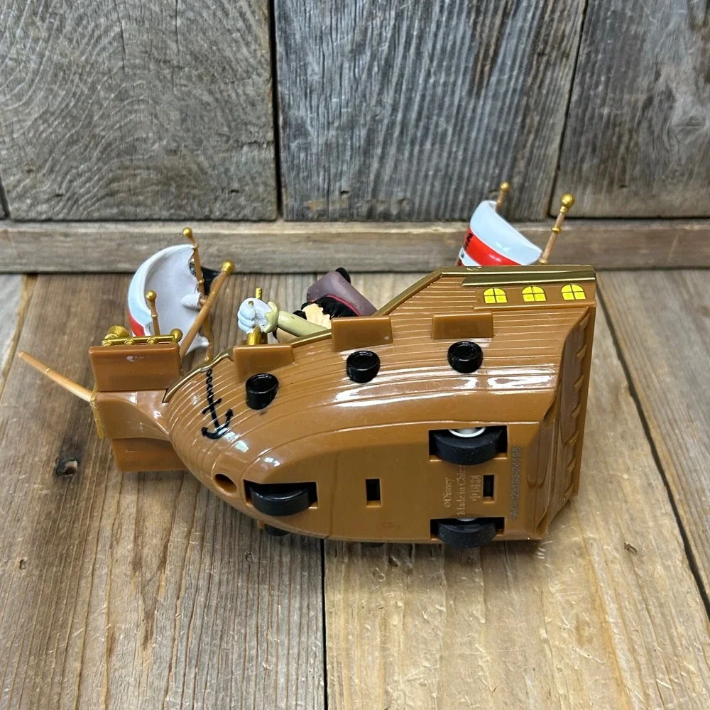Disney Parks Pirates of the Caribbean Mickey Mouse Pirate Ship Toy Rolling Brown